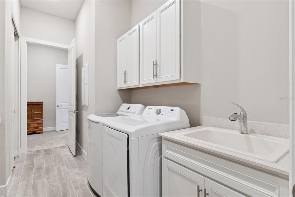 2745 Nature Vw Road St. Cloud, FL 34771 - Photo 26 of 50 a utility room with dryer and washer