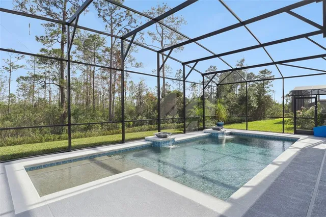 a view of a yard with a tree