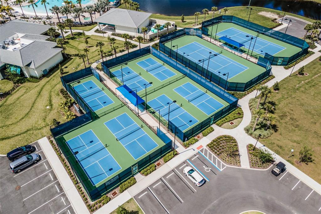 2745 Nature Vw Road St. Cloud, FL 34771 - Photo 35 of 50 an aerial view of a tennis ground with large trees