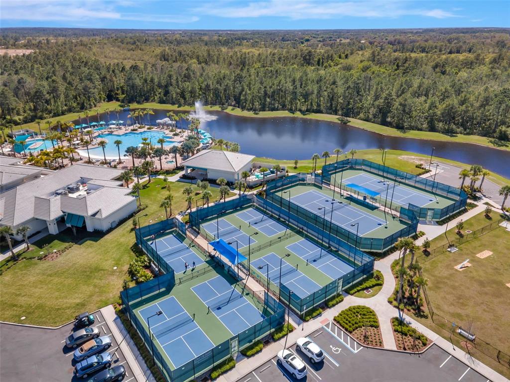 2745 Nature Vw Road St. Cloud, FL 34771 - Photo 36 of 50 an aerial view of a house with swimming pool and lake view