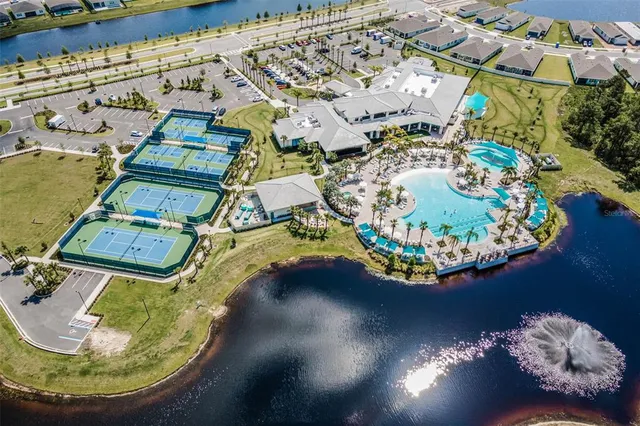 a view of a park with large trees