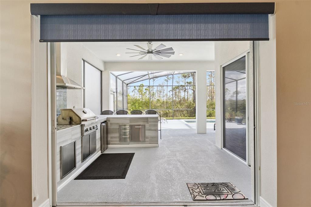 2745 Nature Vw Road St. Cloud, FL 34771 - Photo 7 of 50 a kitchen with a sink and large window