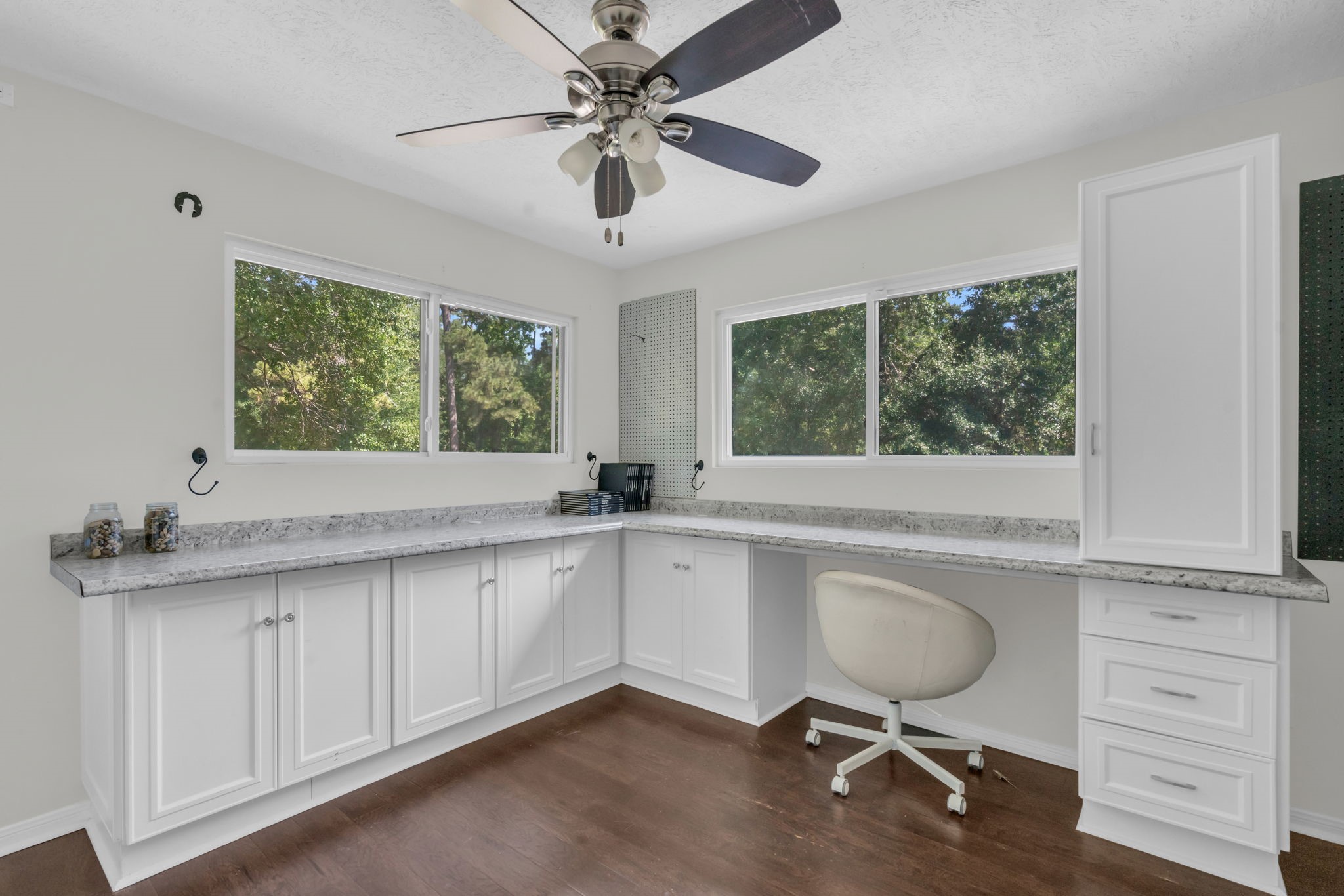 6514 Larkmount Drive Spring, TX 77389 - Photo 28 of 41 Natural light pours into this flexible office or craft space upstairs with built in countertops.