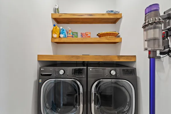 a utility room with dryer and washer