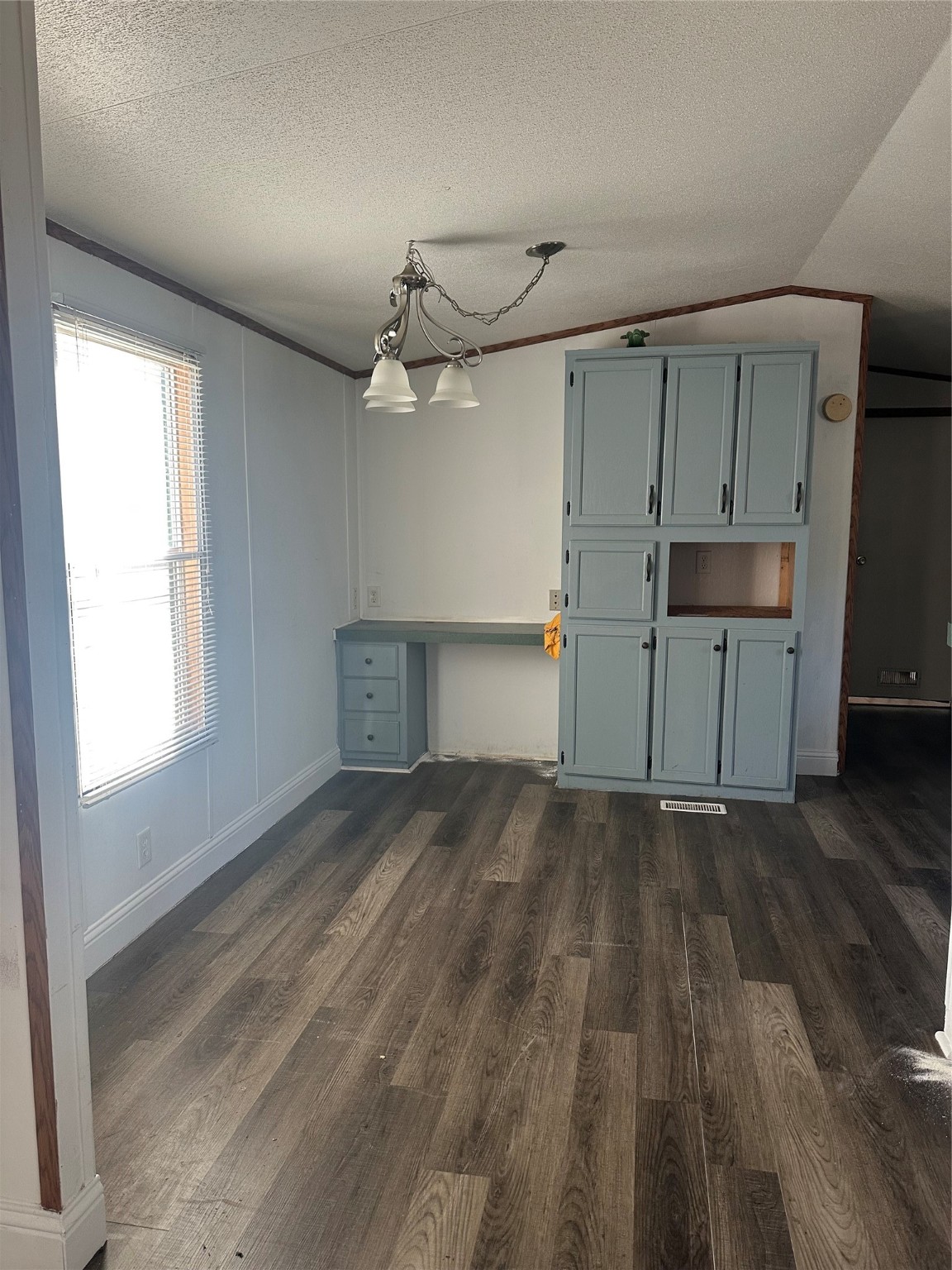 18759 Fire Fly Drive Porter, TX 77365 - Photo 5 of 11 an empty room with wooden floor and windows