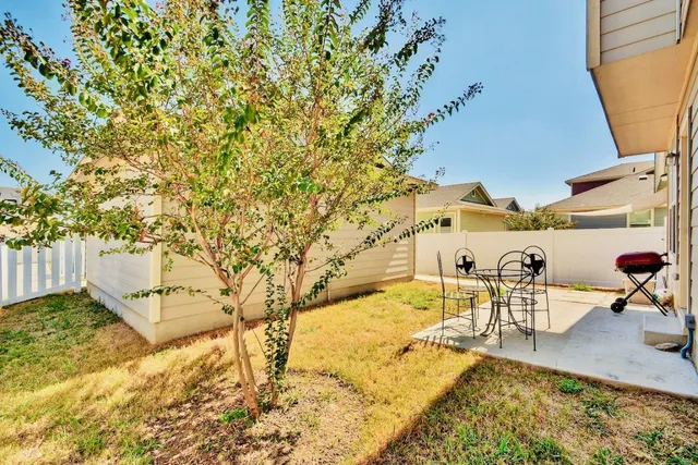 a view of a patio with swimming pool