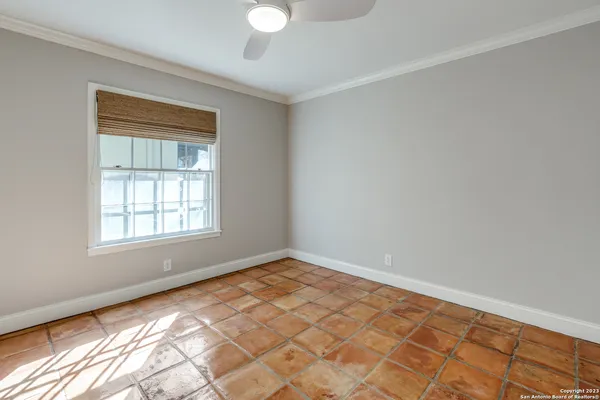 a view of an empty room and window