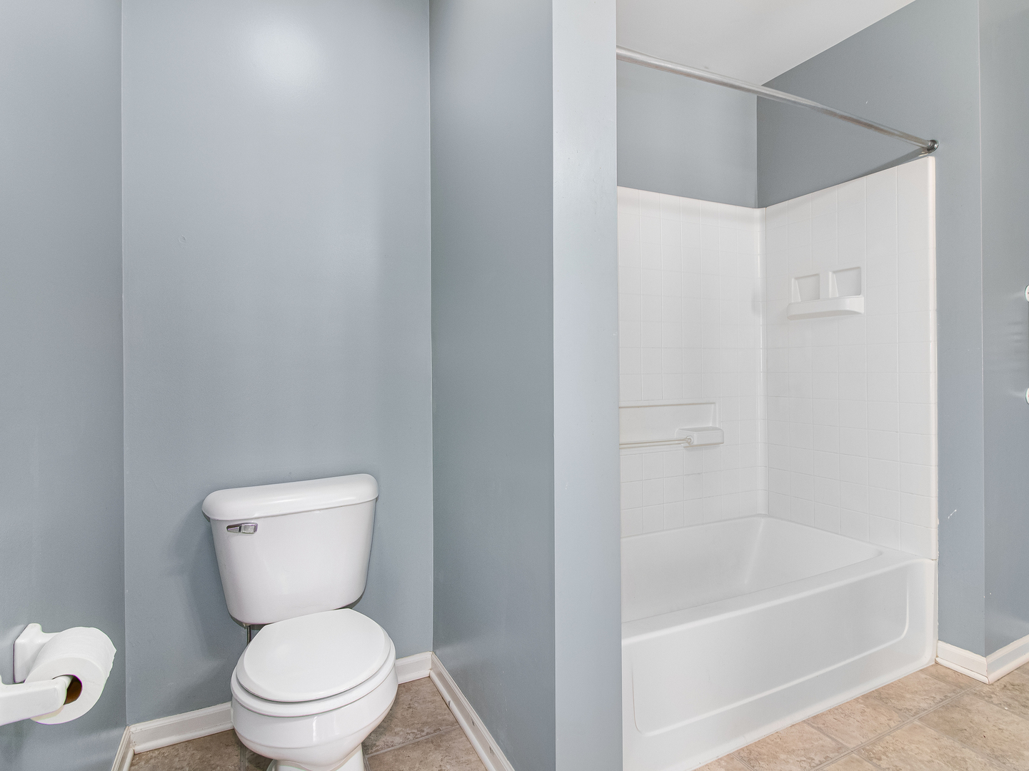 2817 Hoffman Street Plano, IL 60545 - Photo 16 of 25 a white toilet sitting next to a bath tub