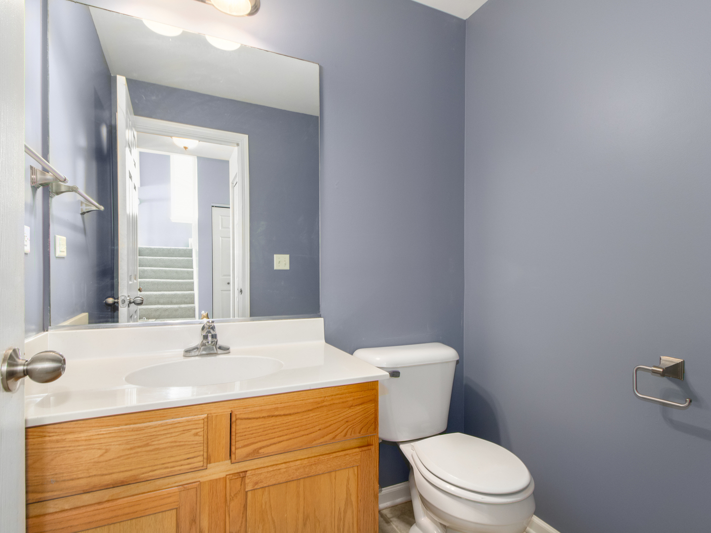 2817 Hoffman Street Plano, IL 60545 - Photo 20 of 25 a bathroom with a sink a toilet and shower