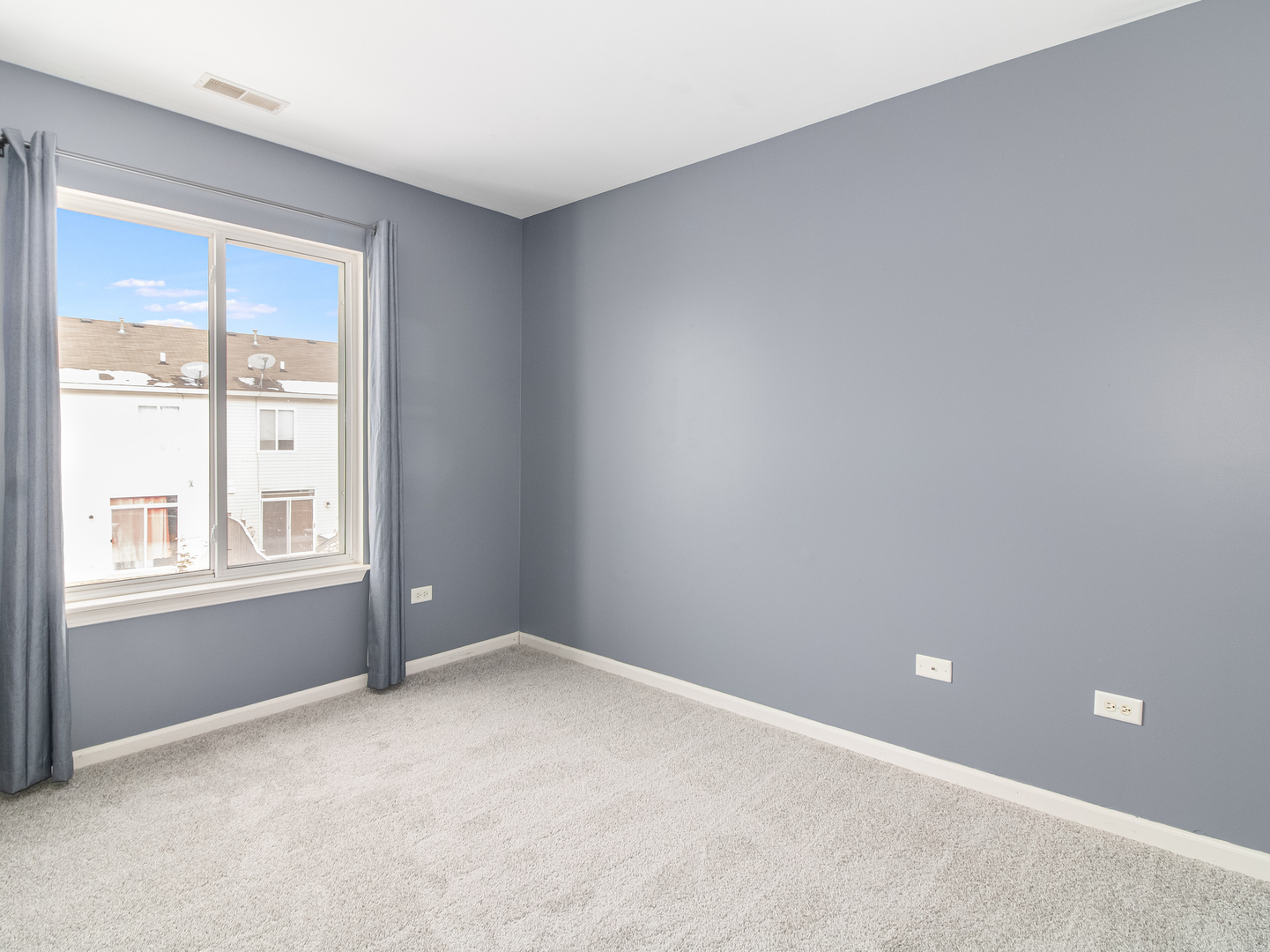 2817 Hoffman Street Plano, IL 60545 - Photo 21 of 25 a view of an empty room with a window