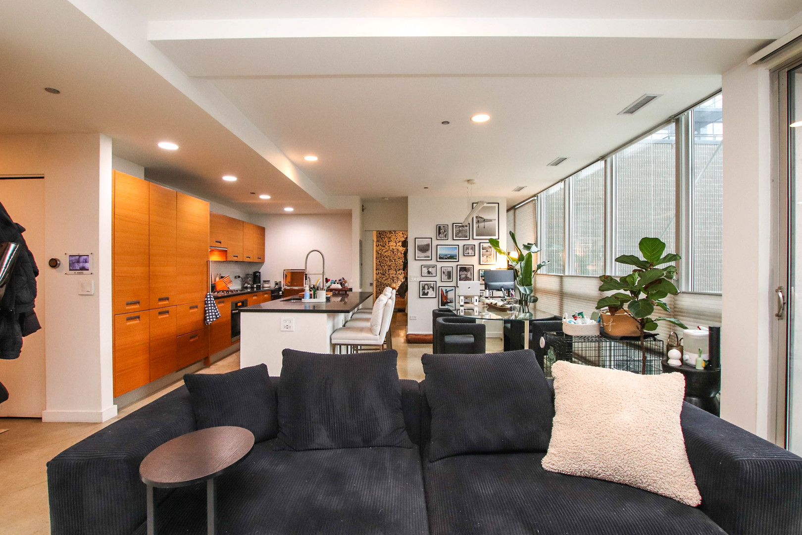 156 West Superior Street, Unit 302 Chicago, IL 60654 - Photo 3 of 17 a living room with furniture and a table