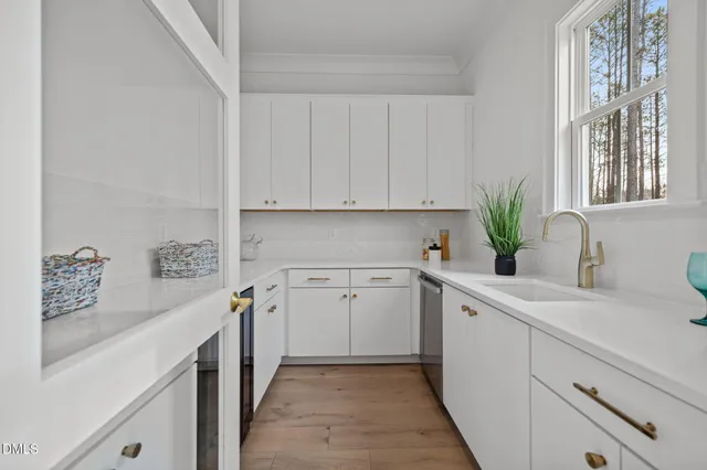 a living room with fireplace furniture and a wooden floor