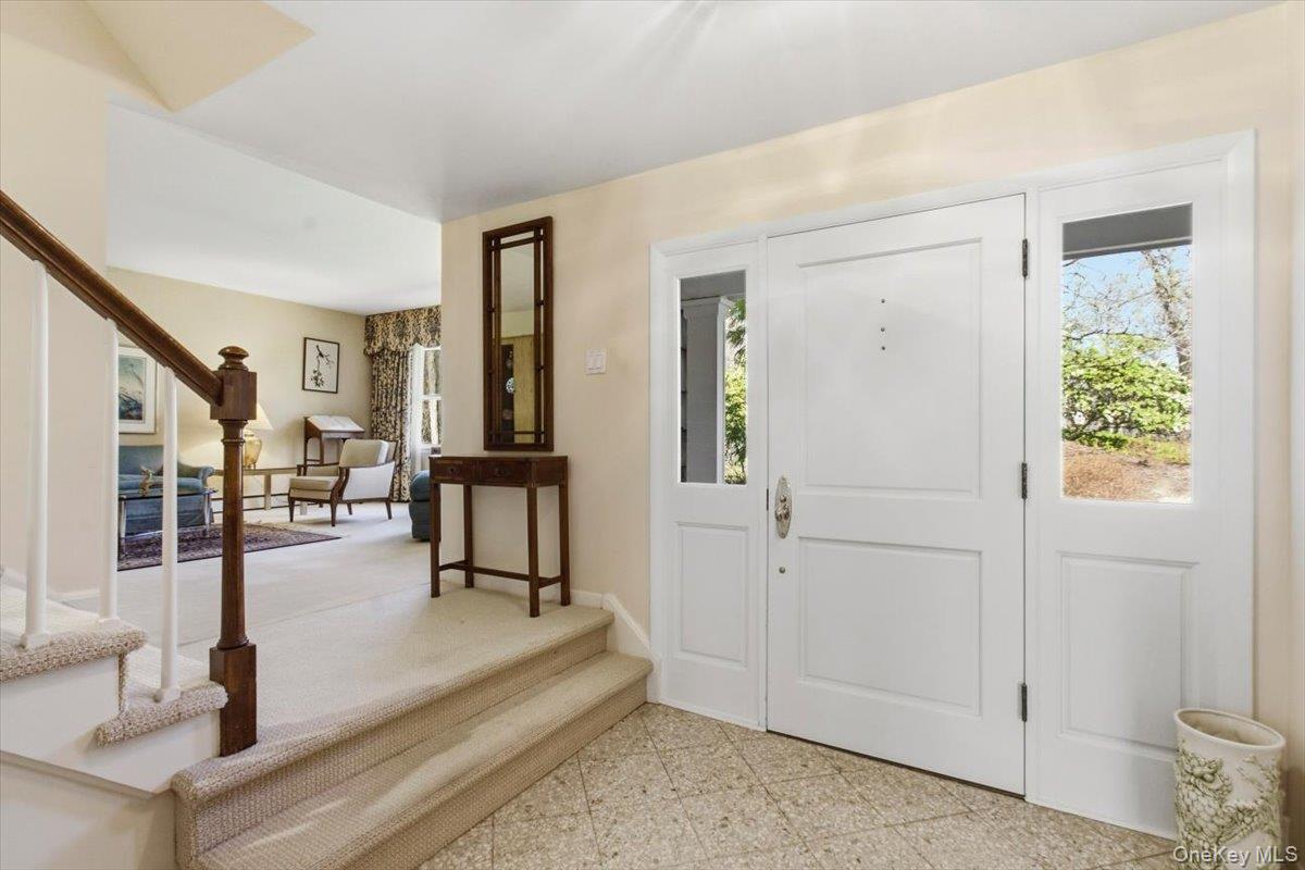 73 Cedar Hill Road Bedford, NY 10506 - Photo 2 of 33 a view of entryway livingroom and hall with wooden floor