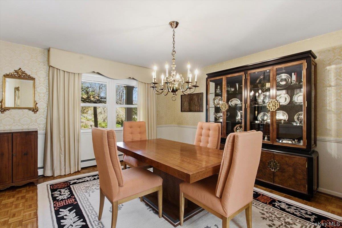 73 Cedar Hill Road Bedford, NY 10506 - Photo 5 of 33 a view of a dining room with furniture window and wooden floor