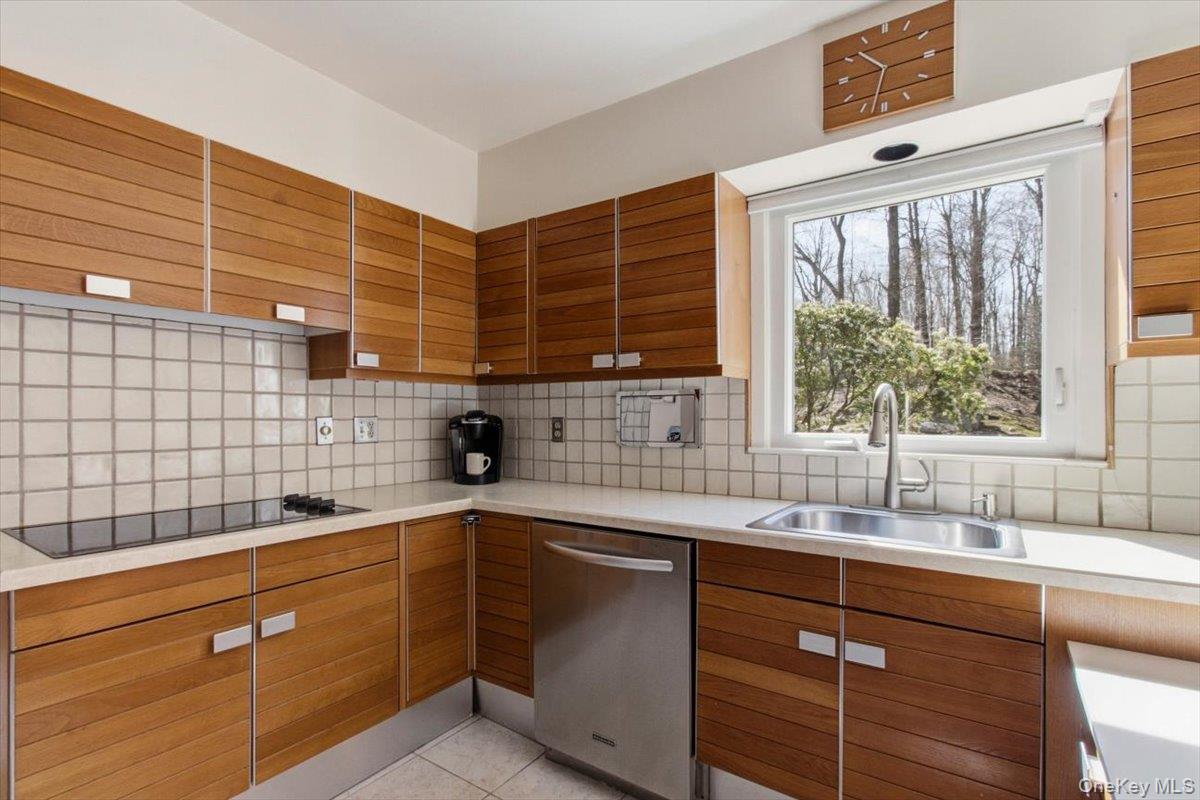 73 Cedar Hill Road Bedford, NY 10506 - Photo 9 of 33 a kitchen with a sink and a window