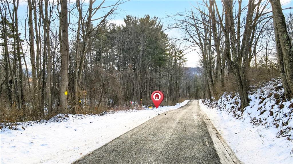 Lot 3 Matson Road Ligonier, PA 15658 - Photo 4 of 29 a view of a wooden fence next to a road