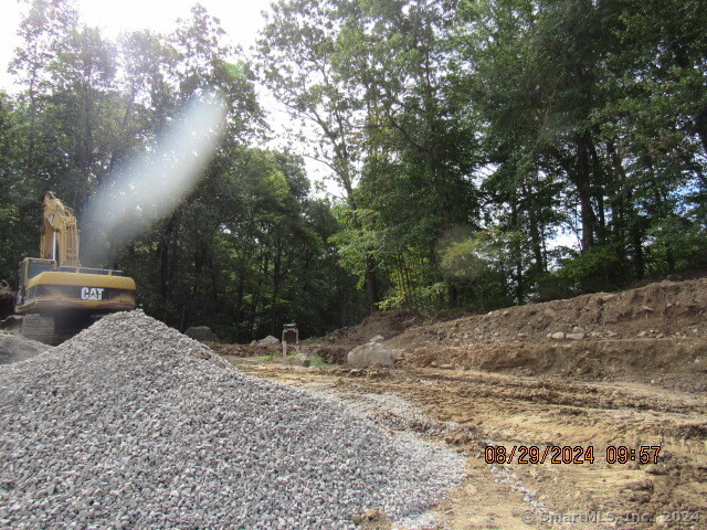 Lot #9 Morning Dove Road, Unit LOT # 9 Naugatuck, CT 06770 - Photo 2 of 7 a view of a backyard of the house