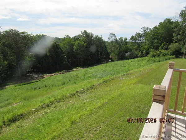 a view of a garden with an outdoor space