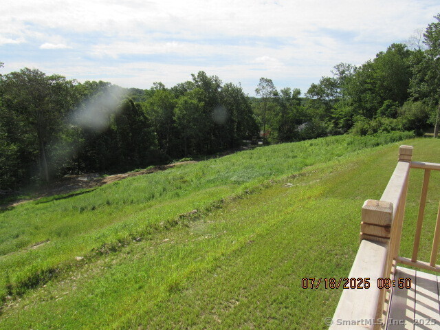 Lot #9 Morning Dove Road, Unit LOT # 9 Naugatuck, CT 06770 - Photo 5 of 7 a view of a garden with an outdoor space