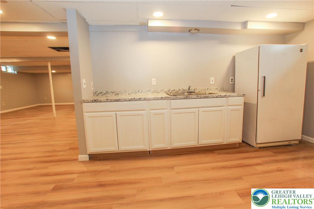 492 Filetown Road Nazareth, PA 18064 - Photo 29 of 30 A well-appointed lower level features a convenient wet bar and ample space for recreation.