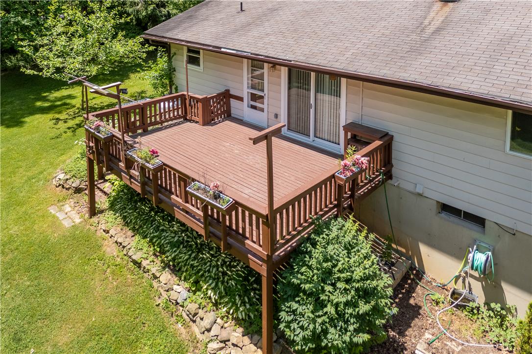 5311 Macungie Mountain Road Macungie, PA 18062 - Photo 28 of 56 A spacious wooden deck provides an elevated outdoor retreat with direct backyard access.