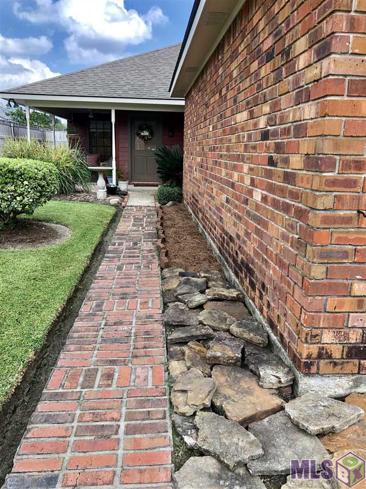 15433 Springwood Avenue Baton Rouge, LA 70817 - Photo 2 of 24 Beautiful brick sidewalk to front entrance