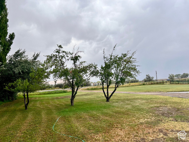 350 West Main Street Emery, UT 84522 - Photo 18 of 28 View of community featuring a lawn and a view of rural / pastoral area
