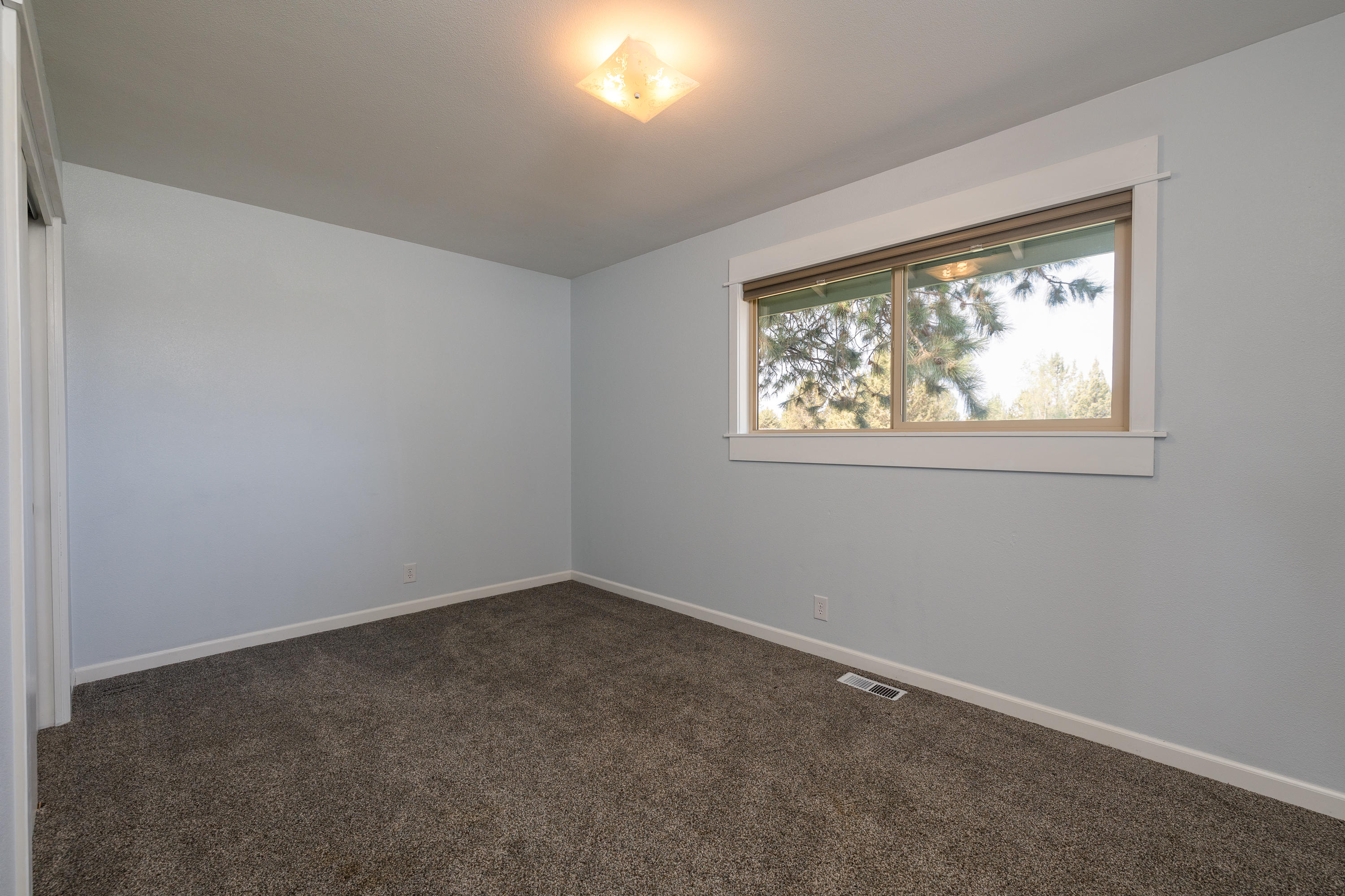 21975 Bear Creek Road Bend, OR 97701 - Photo 18 of 29 Large Bedroom #3