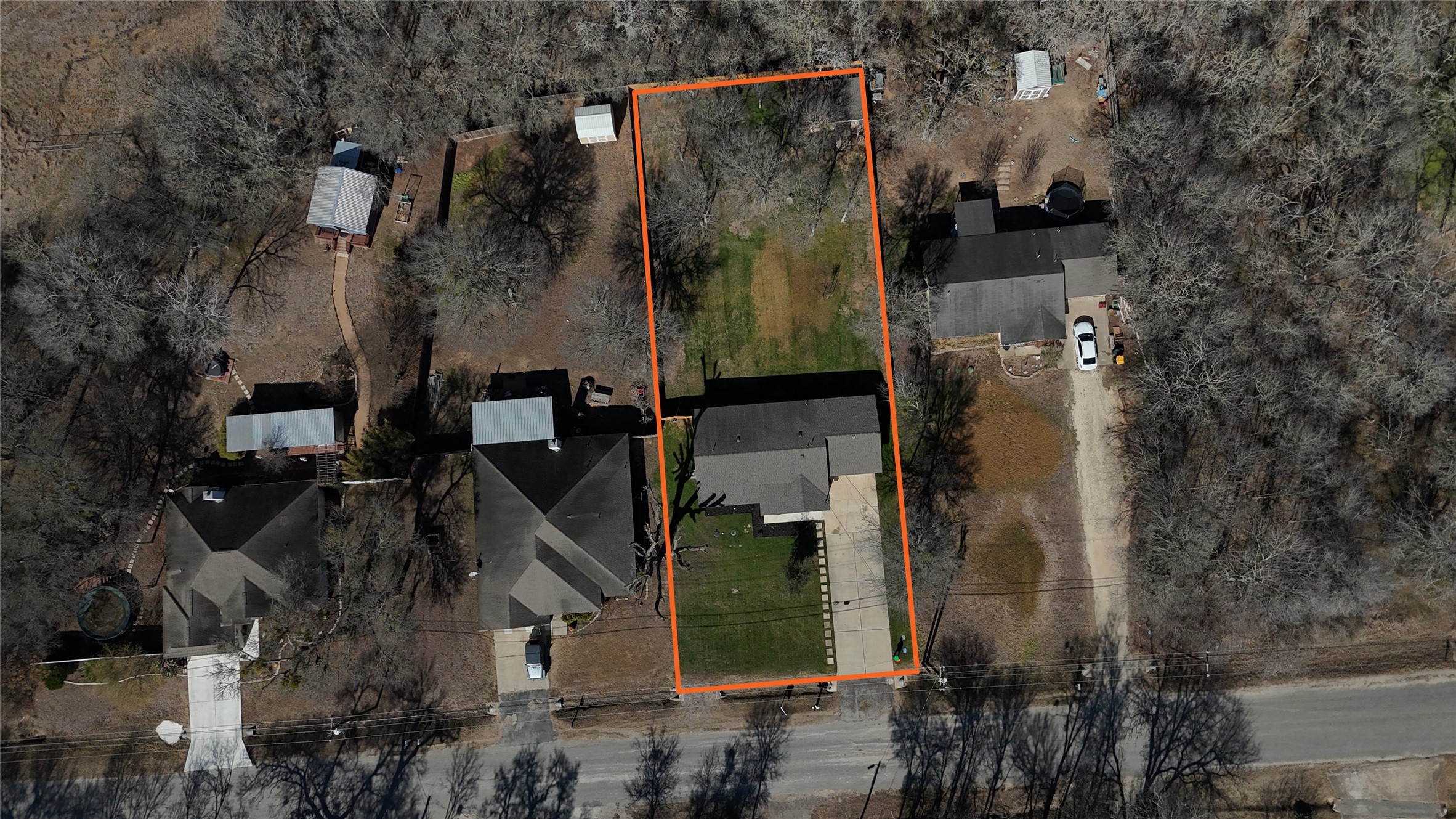 200 Keanahalululu Lane, Unit R Bastrop, TX 78602 - Photo 29 of 32 an aerial view of residential house with outdoor space
