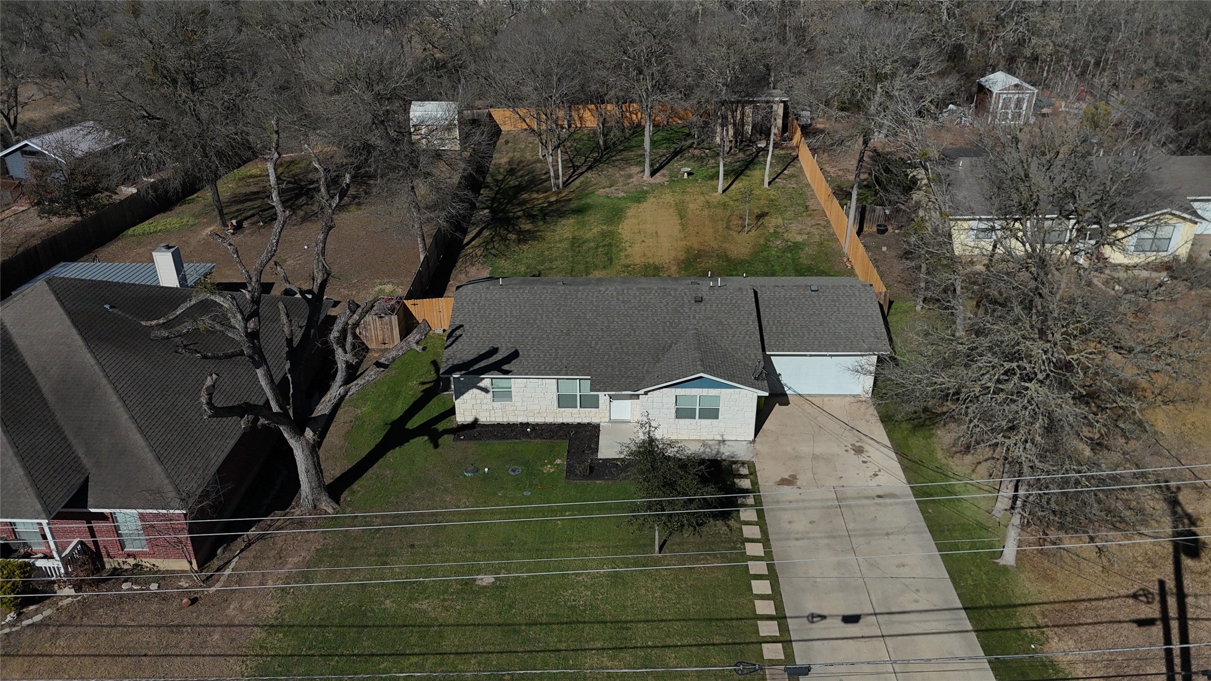 200 Keanahalululu Lane, Unit R Bastrop, TX 78602 - Photo 31 of 32 an aerial view of a house