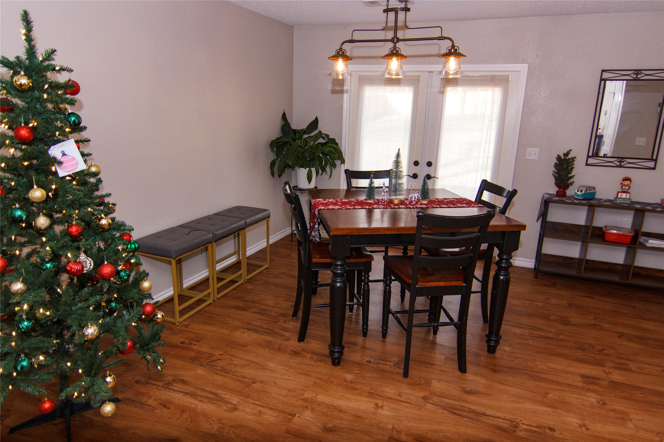 200 Keanahalululu Lane, Unit R Bastrop, TX 78602 - Photo 6 of 32 a view of a dining room with furniture window and wooden floor