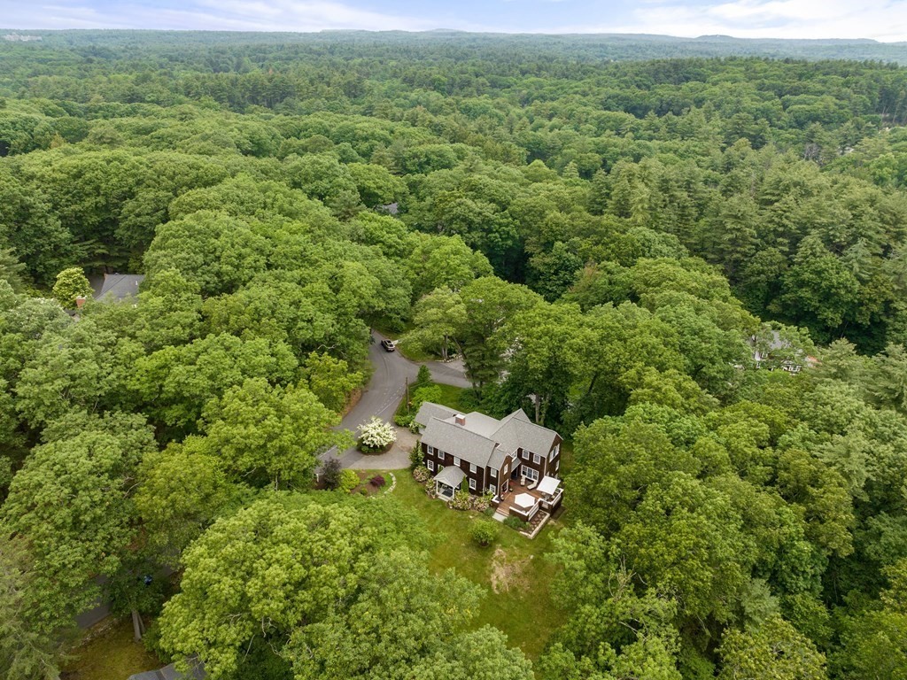 21 Hilltop Road Weston, MA 02493 - Photo 3 of 42 an aerial view of a house with a yard