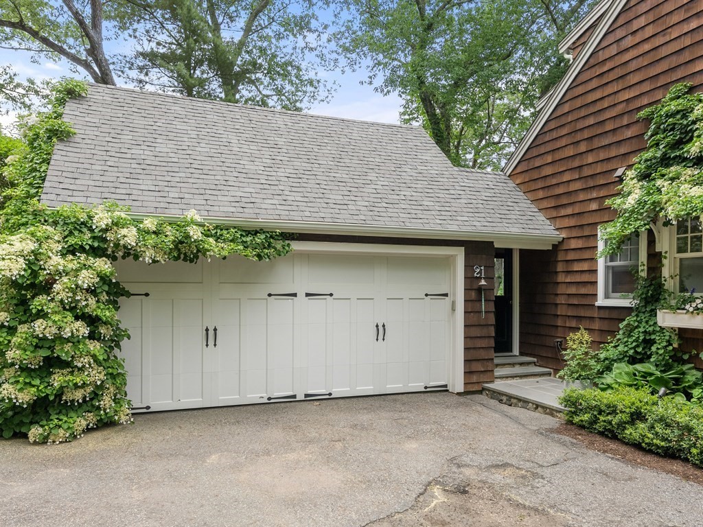 21 Hilltop Road Weston, MA 02493 - Photo 37 of 42 front view of a house with an trees