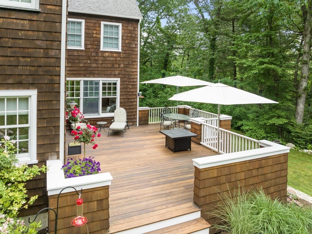 21 Hilltop Road Weston, MA 02493 - Photo 38 of 42 a view of outdoor sitting area with furniture and wooden fence