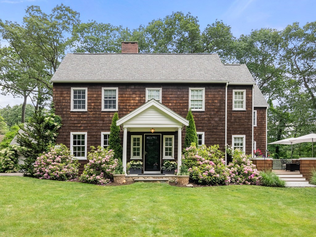 21 Hilltop Road Weston, MA 02493 - Photo 42 of 42 a aerial view of a house with yard and green space