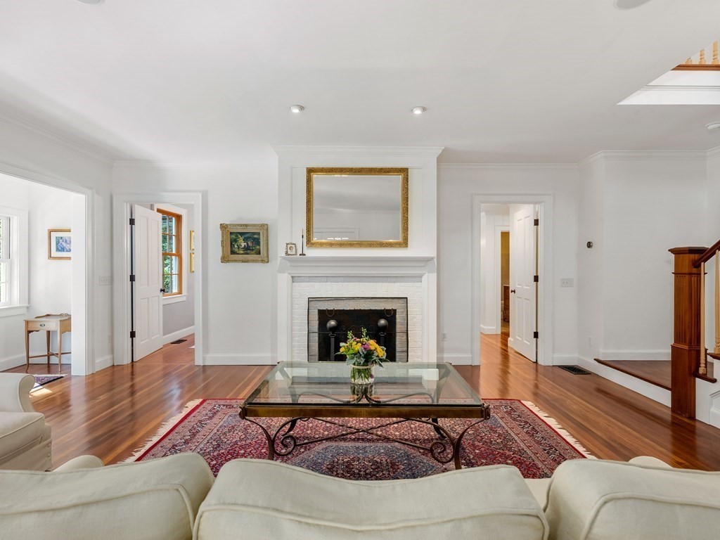 21 Hilltop Road Weston, MA 02493 - Photo 5 of 42 a living room with furniture or fireplace and a wooden floor