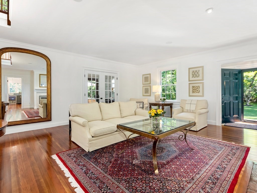 21 Hilltop Road Weston, MA 02493 - Photo 6 of 42 a living room with furniture a rug a window and a table
