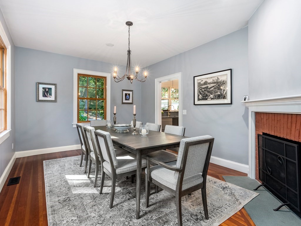 21 Hilltop Road Weston, MA 02493 - Photo 9 of 42 a view of a dining room with furniture window and wooden floor