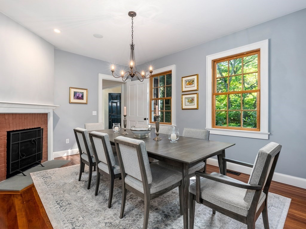 21 Hilltop Road Weston, MA 02493 - Photo 10 of 42 a view of a dining room with furniture window and wooden floor