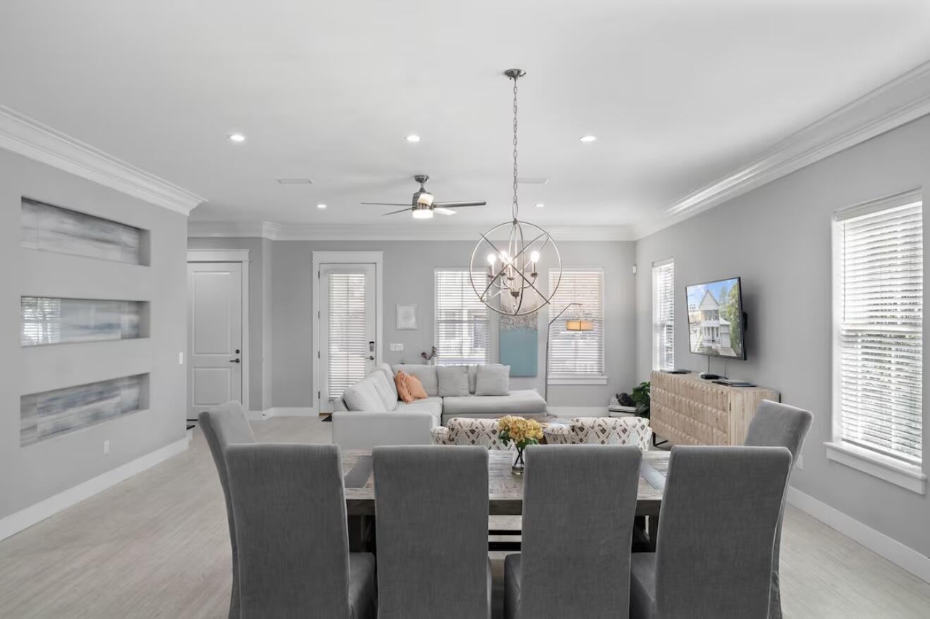 37 Grande Pointe Drive Inlet Beach, FL 32461 - Photo 15 of 58 a dining room with furniture a chandelier and window