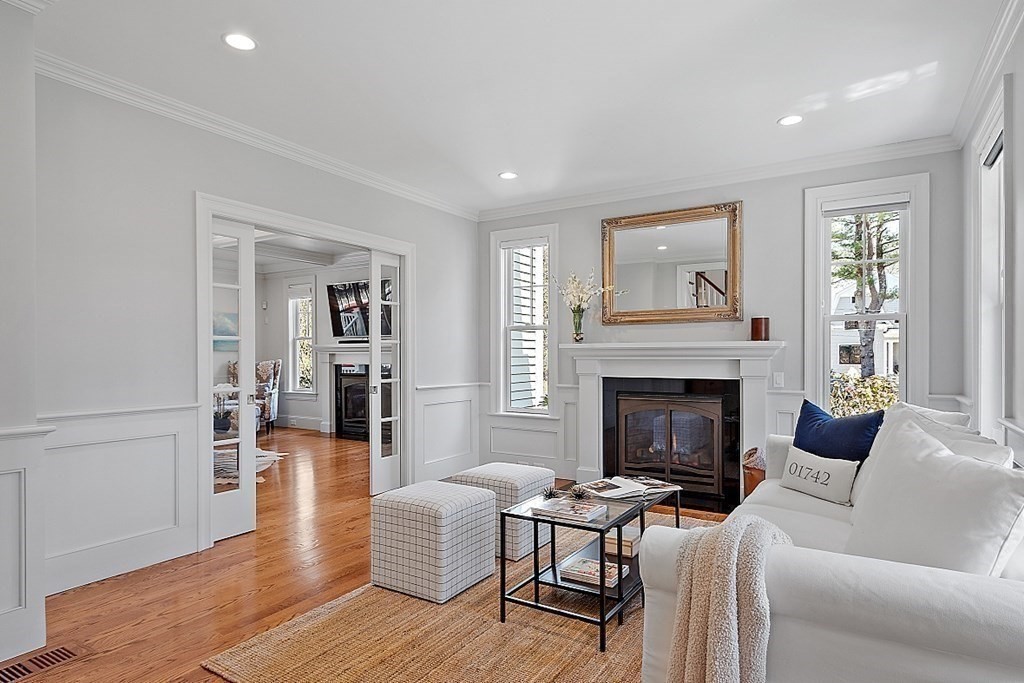 66 Oxbow Road Concord, MA 01742 - Photo 11 of 34 a living room with furniture and a fireplace