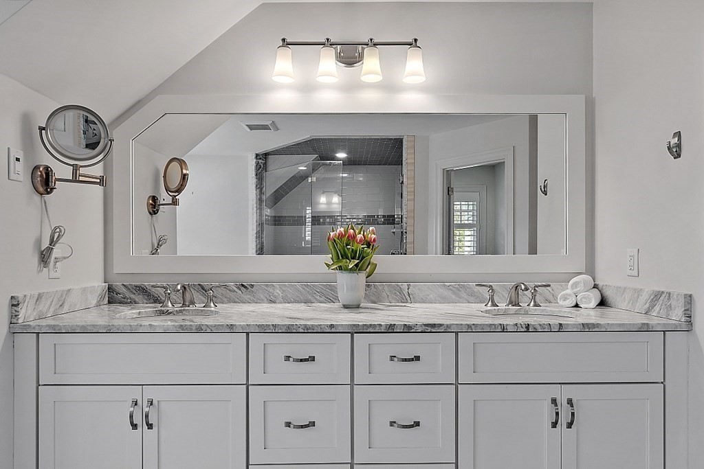 66 Oxbow Road Concord, MA 01742 - Photo 17 of 34 a bathroom with a sink and a mirror