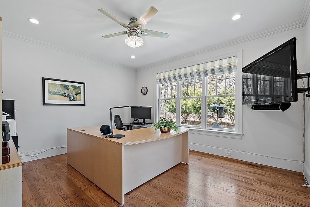 66 Oxbow Road Concord, MA 01742 - Photo 24 of 34 a living room with furniture and a flat screen tv