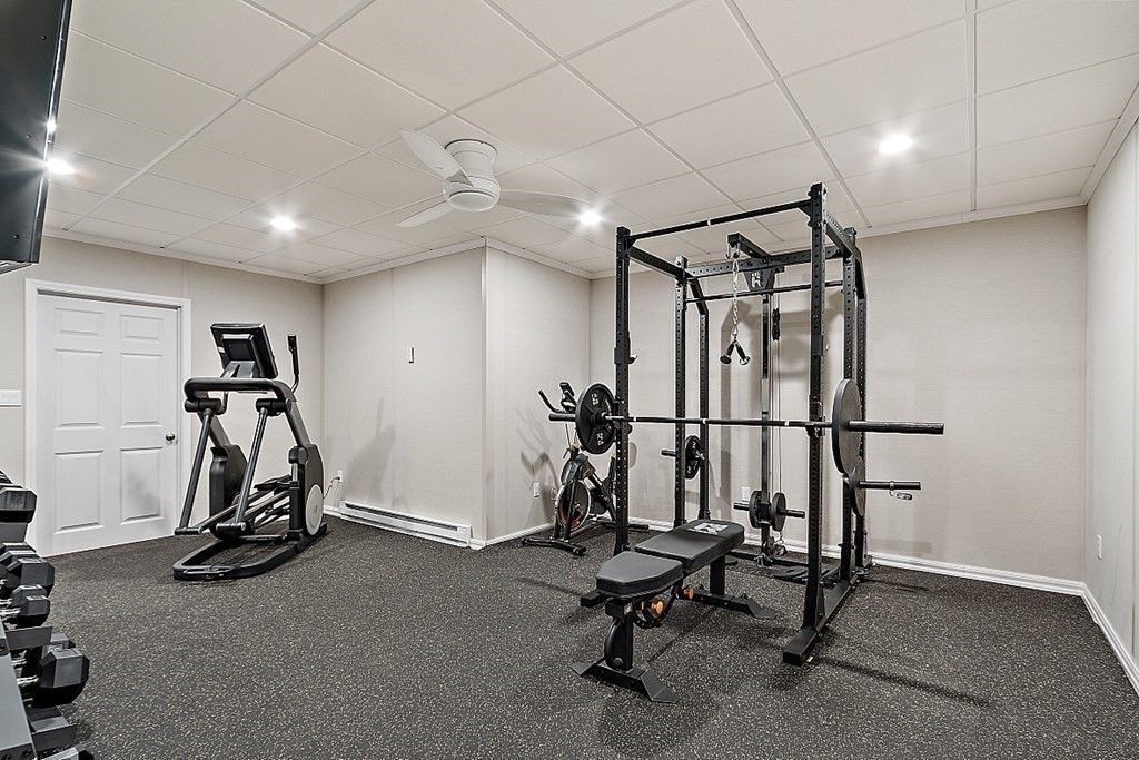 66 Oxbow Road Concord, MA 01742 - Photo 26 of 34 a view of a room with gym equipment