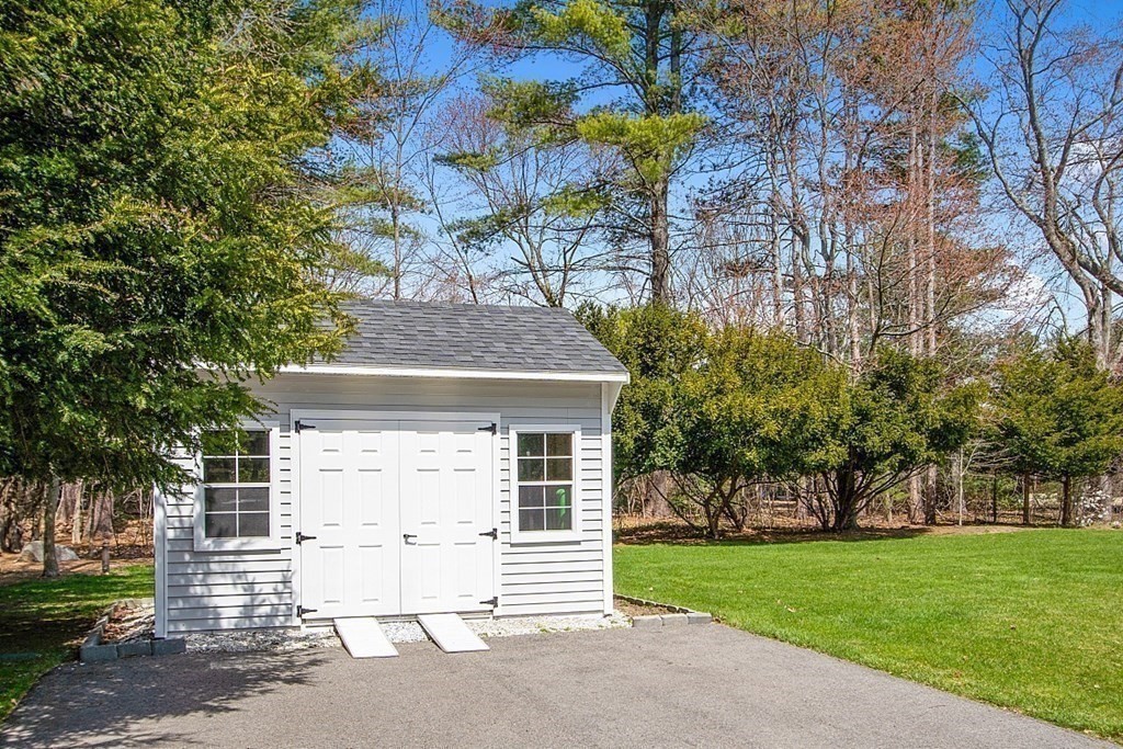 66 Oxbow Road Concord, MA 01742 - Photo 34 of 34 front view of a house with a yard