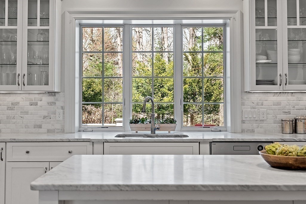 66 Oxbow Road Concord, MA 01742 - Photo 7 of 34 a living room with a large window and couch