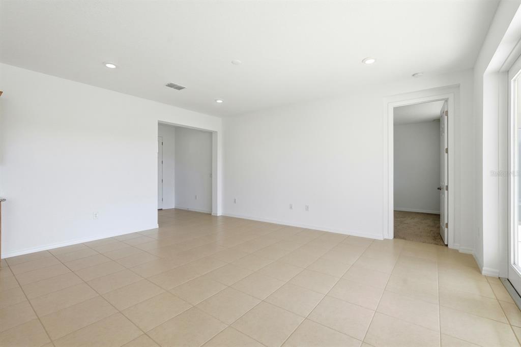 10374 Southwest 96th Street Ocala, FL 34481 - Photo 15 of 29 an empty room with a natural light