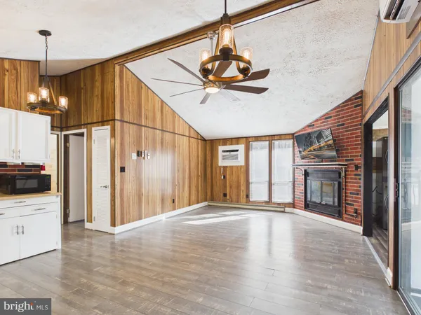 a view of a kitchen with a sink and a kitchen floor