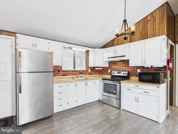 a living room with a fireplace