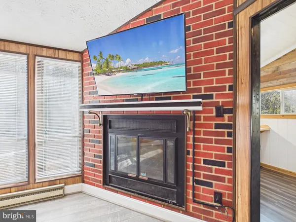 a view of a bedroom with washer and dryer